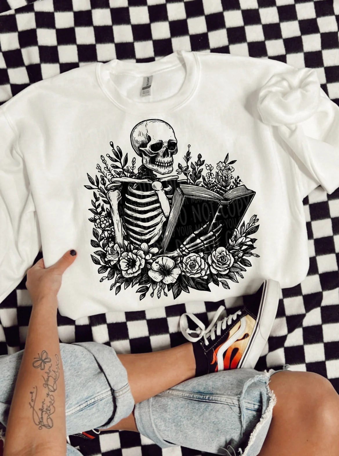 Skelly with book